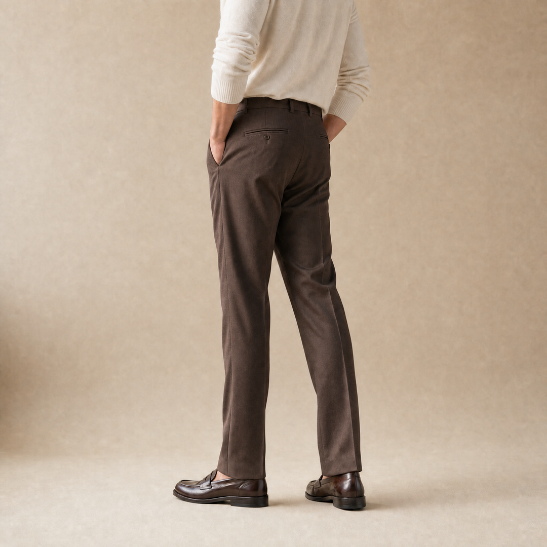 The Pleated Tailored Trouser in Brown, back on model
